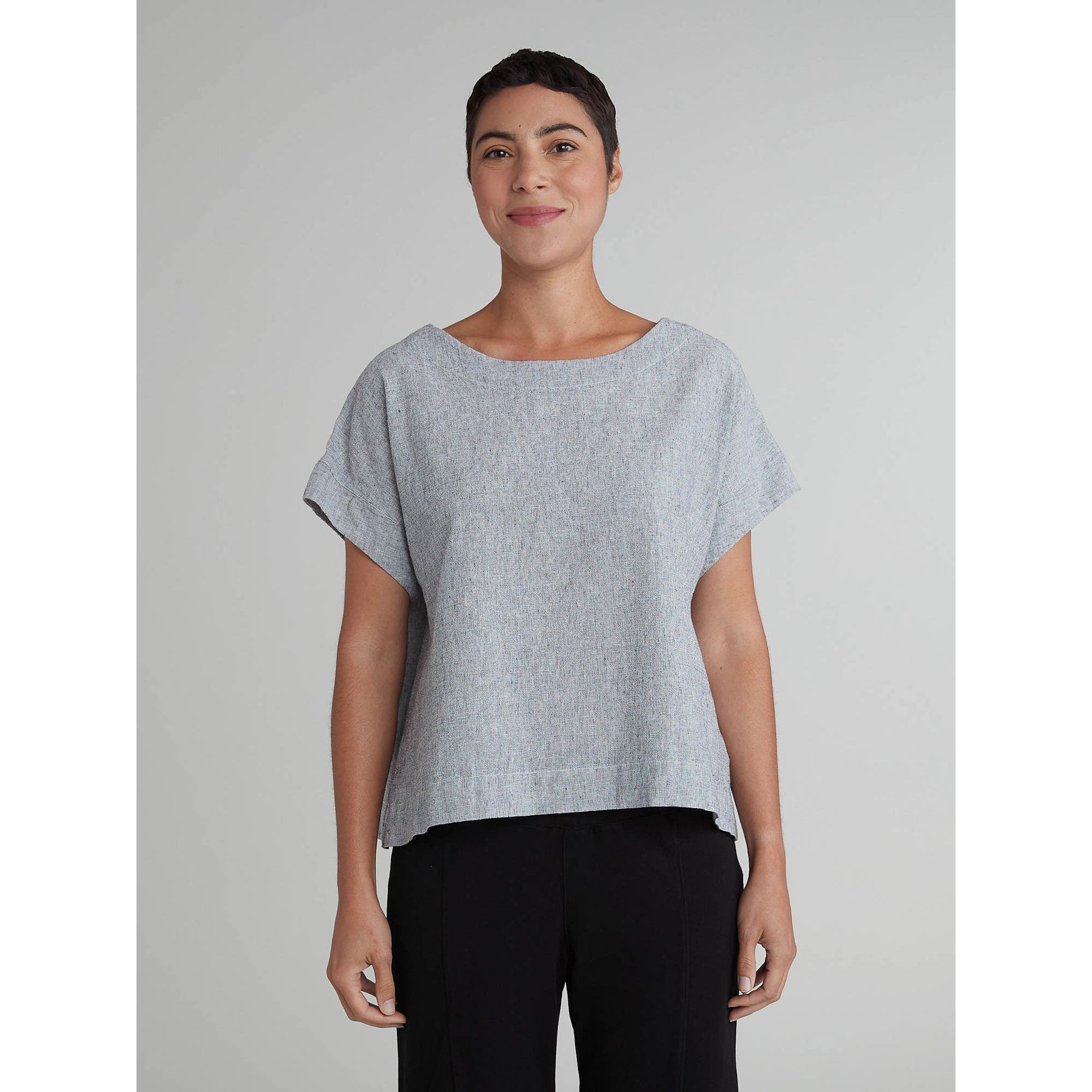Cutloose short sleeve crosshatch crop top in vibrant harbor red fabric, displayed on a hanger.
