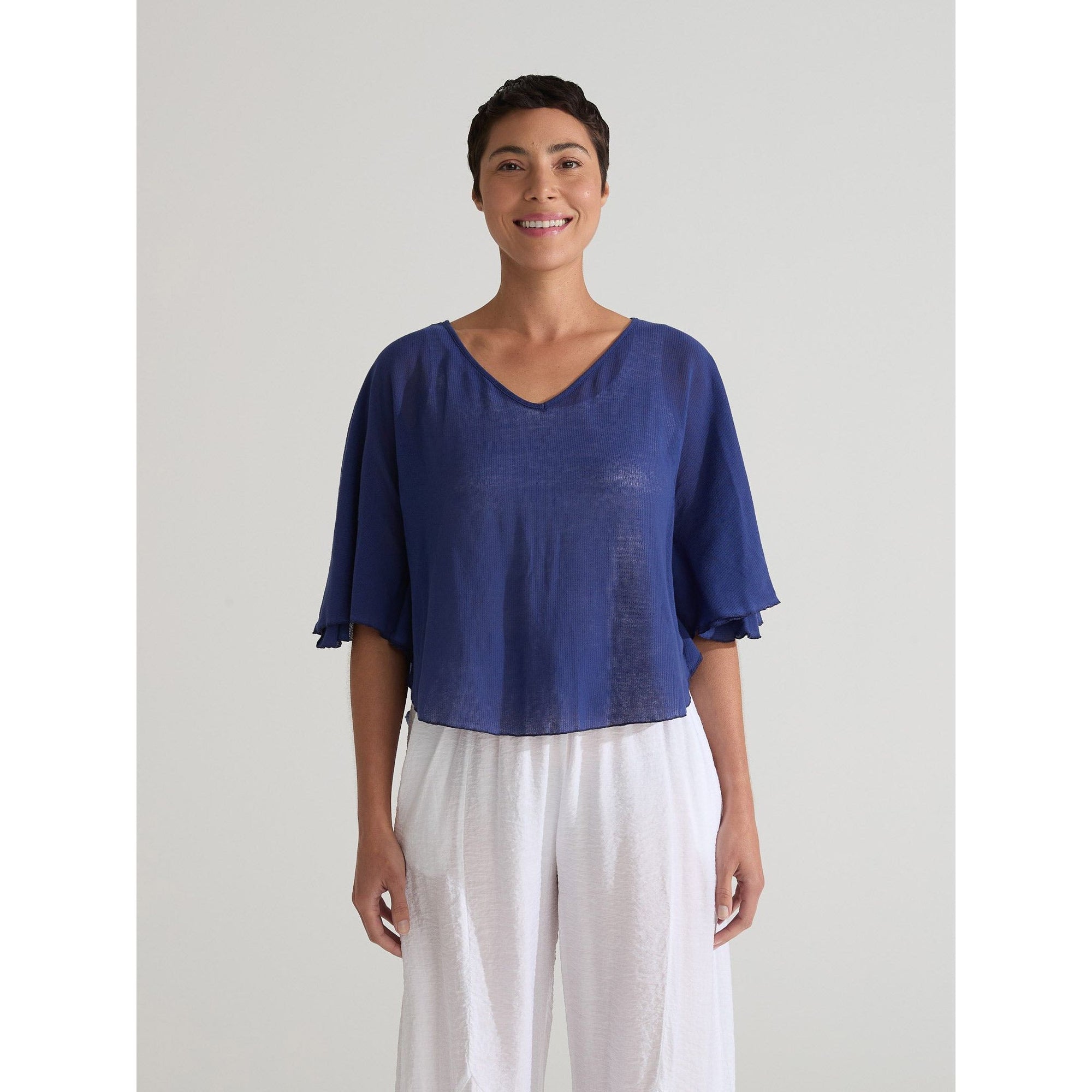 Cutloose Admiralty Tulle Capelet, lightweight sheer fabric with delicate flowy design, perfect for elegant layered outfits.