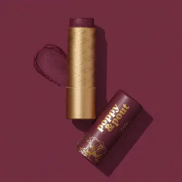 All natural lip tint from Poppy & Pout, showing a close-up of the tinted lips with a subtle, natural finish.