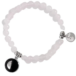 Moonglow Moonstone Bracelet featuring polished moonstone beads on an elastic band, showcasing its luminous, calming stones.