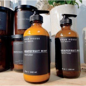 Ryan House Candles Rosemary Sage hand lotion in a sleek bottle, showcasing the natural herbal scent and smooth lotion texture.