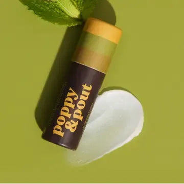 Natural lip balm by Poppy & Pout in a sleek tube, showcasing its smooth, nourishing formula for soft, hydrated lips.