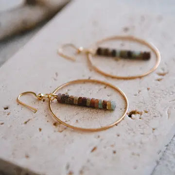 Serpentine turquoise and gold hoop drop earrings by Cecelia Designs Jewelry, featuring vibrant turquoise stones and elegant gold hoops.