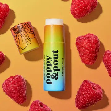 Poppy & Pout 100% natural lip balm in a small container with a clear lid, showing smooth, nourishing balm inside.