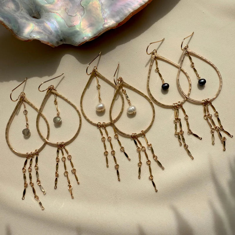 In Situ Ipanema gold fill earrings with white pearls, elegant jewelry featuring round pearl accents on gold hooks.