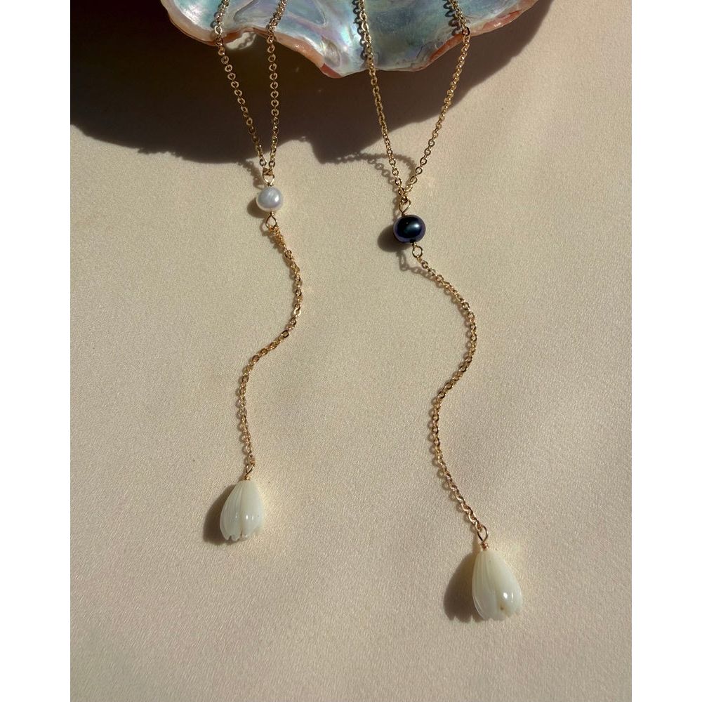 In Situ Penelope Lariat Necklace, 18-inch gold-filled jewelry with a delicate, elegant design, displayed on a neutral background.