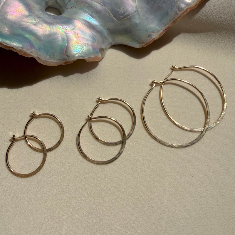In Situ Brooke Earrings in gold fill, medium size, featuring sleek, polished gold hoops perfect for elegant jewelry styling.