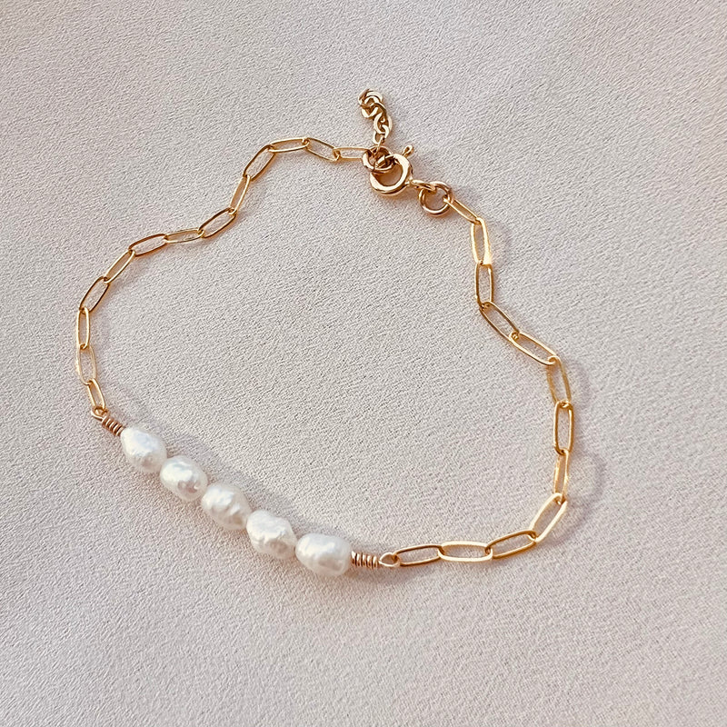 In Situ Vive Chain Bracelet GF made of gold-plated jewelry with a delicate chain design and secure clasp.