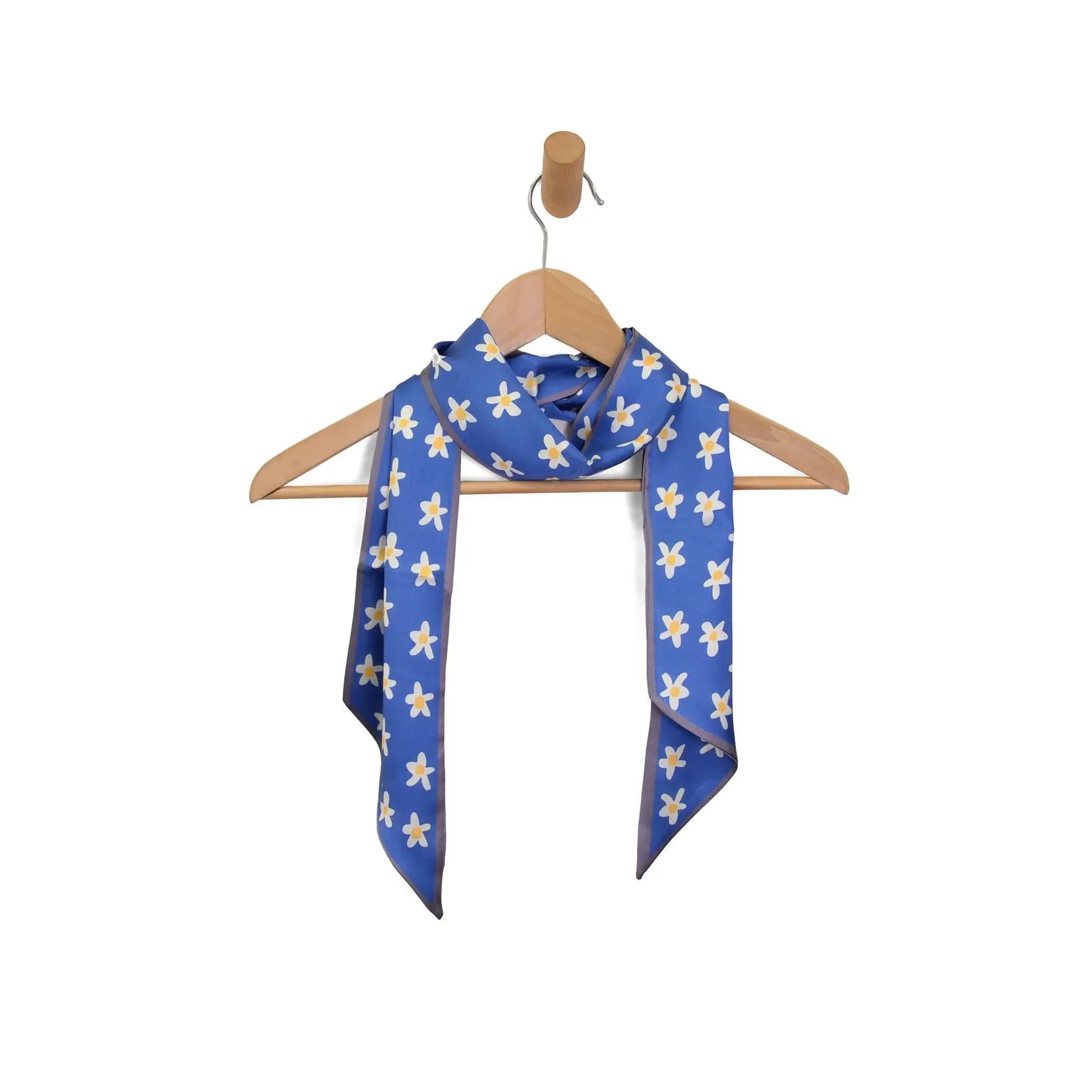 Joy Susan purse with colorful scarf detail, stylish accessory made of soft material, showcasing a vibrant and trendy design.