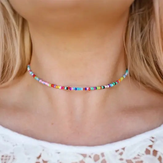 Bohemian Rainbow Seed Bead Choker necklace featuring colorful seed beads and a bohemian style jewelry design.