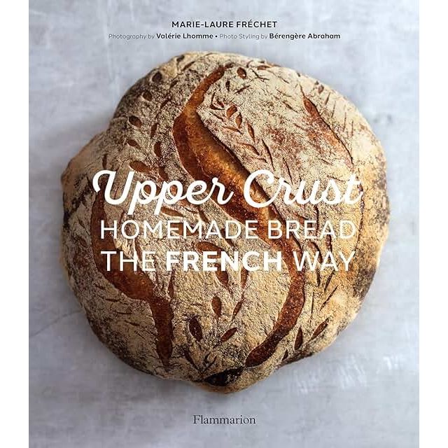 Cover of "Upper Crust Homemade Bread: The French Way" cookbook by Book Publisher, featuring a freshly baked French-style bread.
