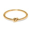 Brighton Interlok single knot hinged gold bangle with smooth polished finish, stylish and elegant jewelry accessory.