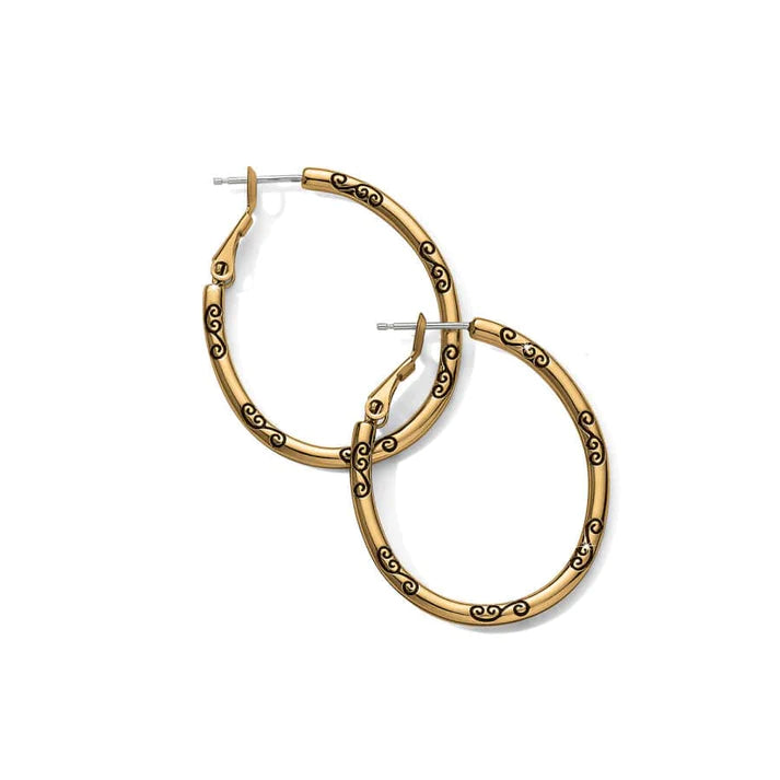 Gold Brighton oval hoop charm earrings with a smooth, polished finish, featuring small dangling charms for a stylish look.
