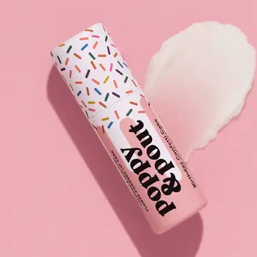 Natural Poppy & Pout Lip Balm in a sleek container, showcasing smooth, nourishing balm for soft, hydrated lips.