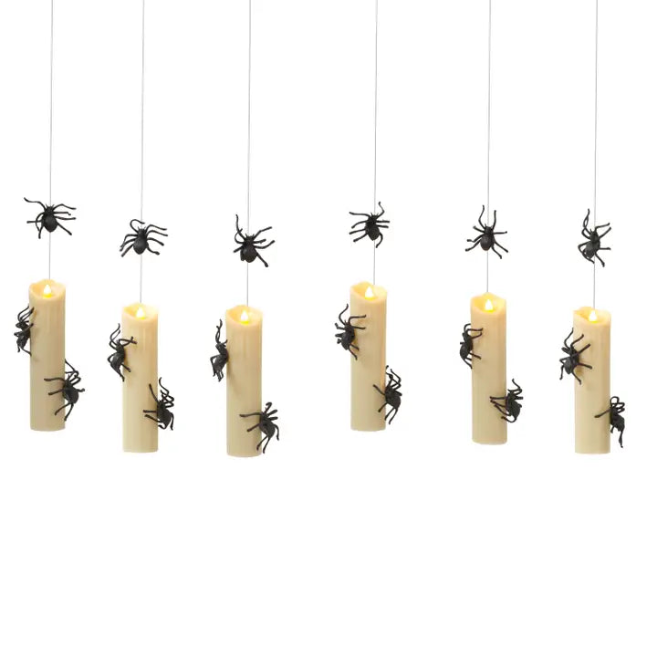 Set of six Gerson lighted hanging Halloween candlesticks with remote control, featuring spooky candle designs for seasonal decor.
