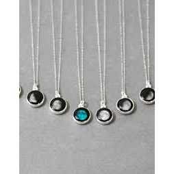 Moonglow Classic Pendant Necklace featuring a round moonstone pendant on a silver chain, elegant and timeless jewelry piece.