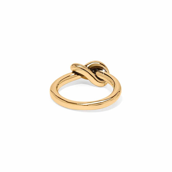 Brighton Interlok Single Knot Ring in gold, showcasing a sleek and elegant design with a simple knot detail on a plain background.