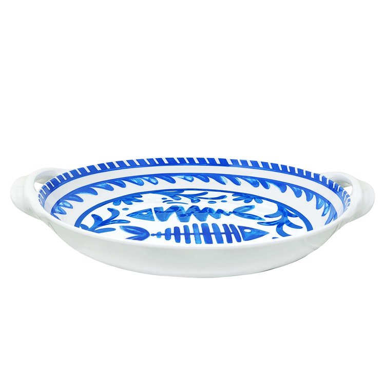 Le Cadeux Mediterraneo large shallow handled bowl with a decorative pattern, suitable for serving or display.