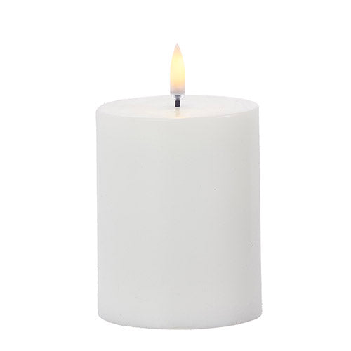 White Raz Uyuni 3x5 inch pillar candle with smooth wax finish, ideal for home decor and ambiance.