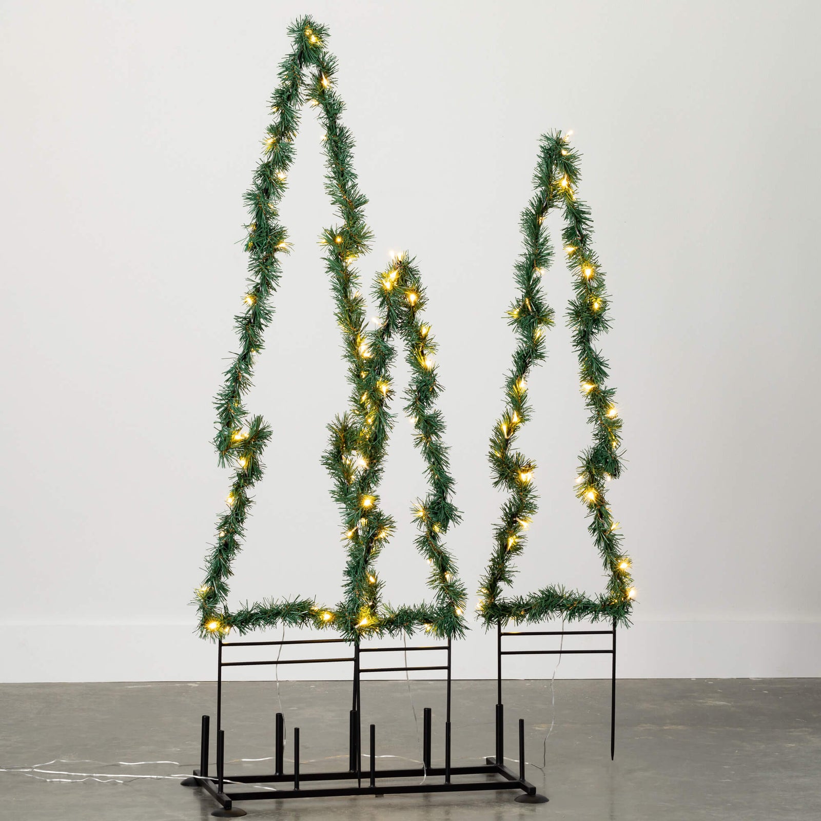 Sullivans LED tree stake for indoor or outdoor seasonal holiday decoration with 11 small warm white LED lights.