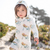 Hooded Bamboo Romper - Floral Bicycles - Zinnias Gift Boutique