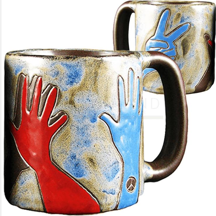 Mara 16oz round ceramic mug with a peace sign design, featuring a white background and a comfortable handle.